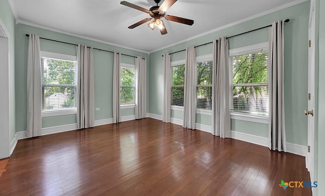 905 N 33rd St, Waco, TX 76707 - empty room featuring ceiling fan, hardwood / wood-style floors, and crown molding