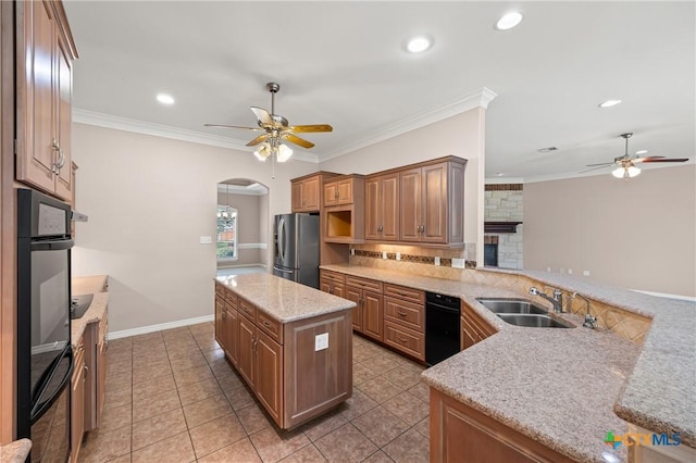 2206 Pheasant Run Ln, Temple, TX 76502 - kitchen with ceiling fan, stainless steel fridge with ice dispenser, backsplash, arched walkways, and recessed lighting