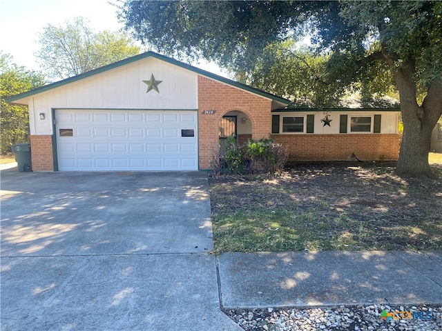 single story home featuring a garage