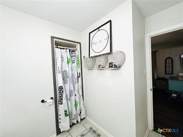 interior space with tile patterned floors