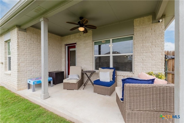 view of patio featuring ceiling fan