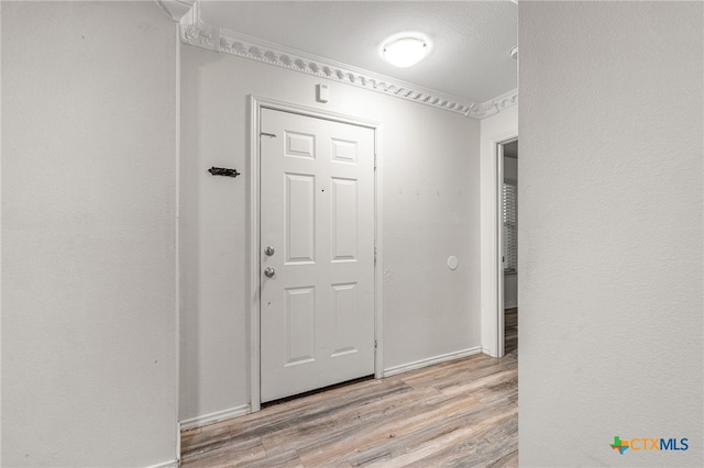 corridor featuring light hardwood / wood-style flooring