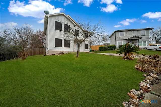 exterior space featuring a front lawn