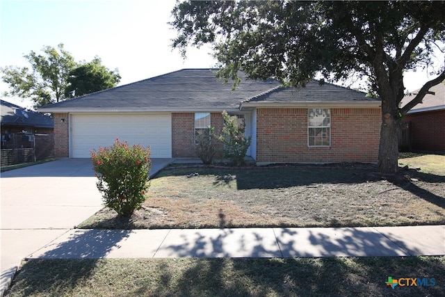 single story home featuring a garage