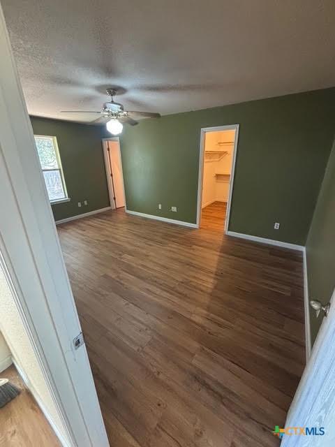 4306 Menard Dr, Killeen, TX 76549 - spare room with wood finished floors, baseboards, and ceiling fan