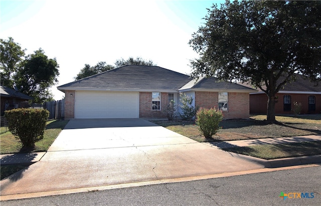 single story home with a garage