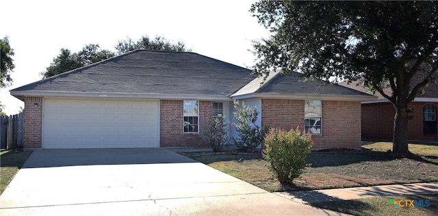 single story home with a garage