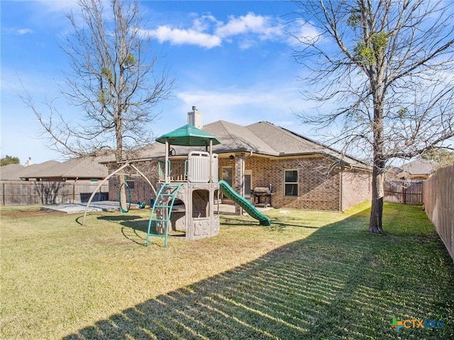 view of playground featuring a yard