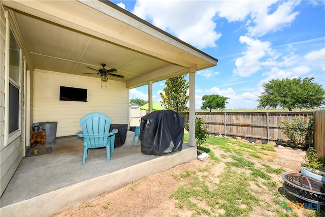 view of patio with grilling area and ceiling fan