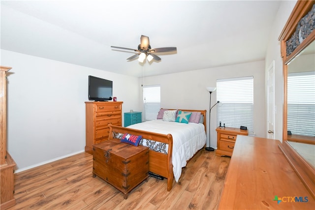 bedroom featuring light wood-type flooring and ceiling fan