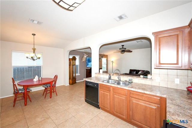 kitchen with decorative light fixtures, decorative backsplash, sink, dishwasher, and ceiling fan with notable chandelier