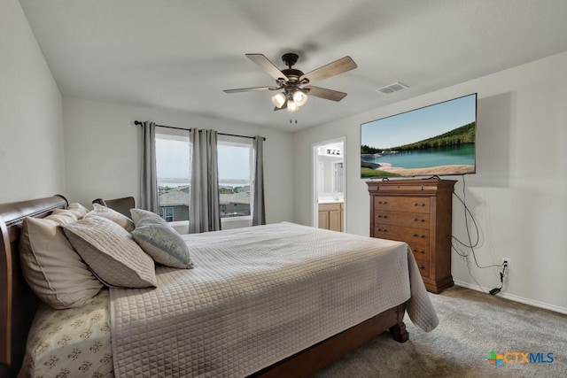 bedroom featuring baseboards, carpet flooring, and a ceiling fan
