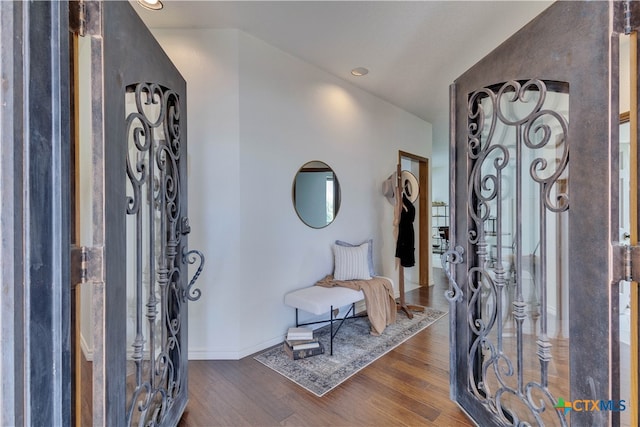 foyer with dark wood-type flooring