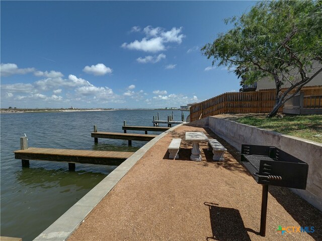 dock area featuring a water view