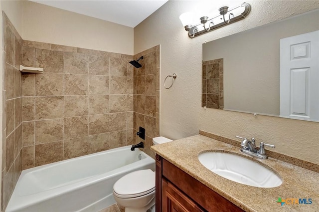 608 Chimney Rock Dr, Victoria, TX 77904 - full bath featuring toilet, bathtub / shower combination, vanity, and a textured wall