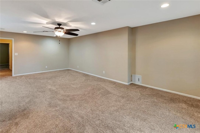 608 Chimney Rock Dr, Victoria, TX 77904 - empty room with a ceiling fan, light colored carpet, recessed lighting, and baseboards