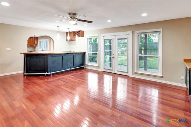 608 Chimney Rock Dr, Victoria, TX 77904 - unfurnished living room with ceiling fan, baseboards, wood finished floors, and recessed lighting