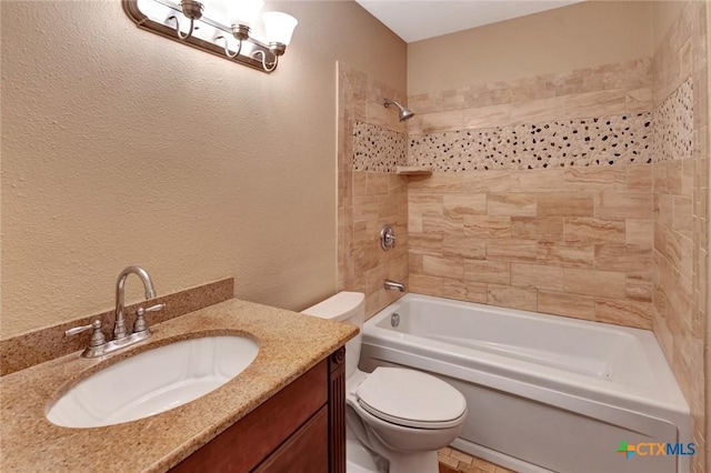 608 Chimney Rock Dr, Victoria, TX 77904 - bathroom featuring toilet, shower / tub combination, vanity, and a textured wall