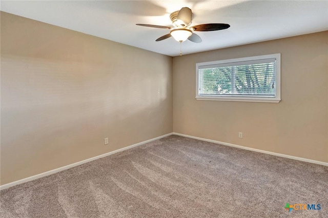608 Chimney Rock Dr, Victoria, TX 77904 - spare room with carpet floors, baseboards, and ceiling fan