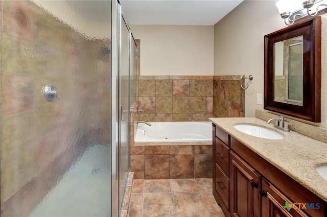 608 Chimney Rock Dr, Victoria, TX 77904 - full bathroom with a tub with jets, a shower stall, and double vanity