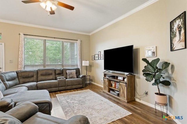 1307 Branchwood Way, Temple, TX 76502 - living room featuring crown molding, ceiling fan, baseboards, and dark wood-style floors