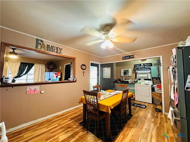 27 County Road 398, TX 77987 - dining space with washer / clothes dryer, ornamental molding, ceiling fan, light wood finished floors, and baseboards