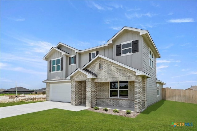 3820 Keller Rd, Temple, TX 76504 - view of front of home with board and batten siding, an attached garage, driveway, and brick siding