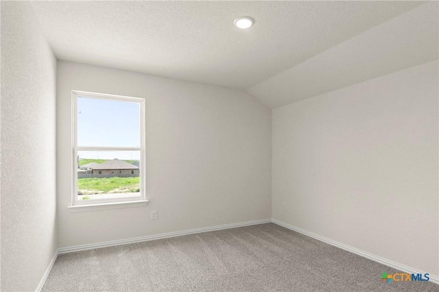 3820 Keller Rd, Temple, TX 76504 - carpeted spare room with baseboards and vaulted ceiling