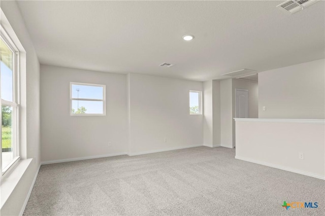 3820 Keller Rd, Temple, TX 76504 - spare room with attic access, light colored carpet, and recessed lighting