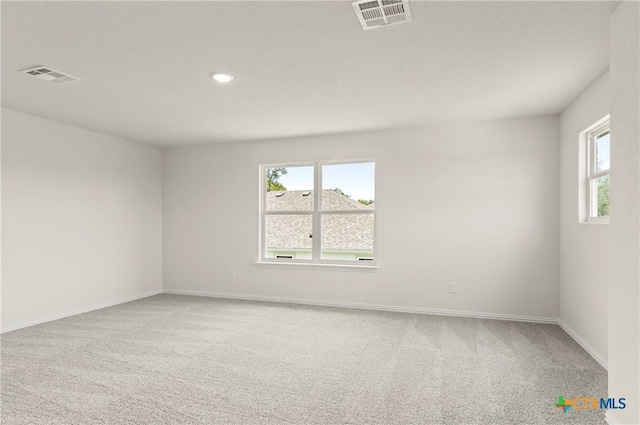 3820 Keller Rd, Temple, TX 76504 - spare room with light colored carpet and recessed lighting