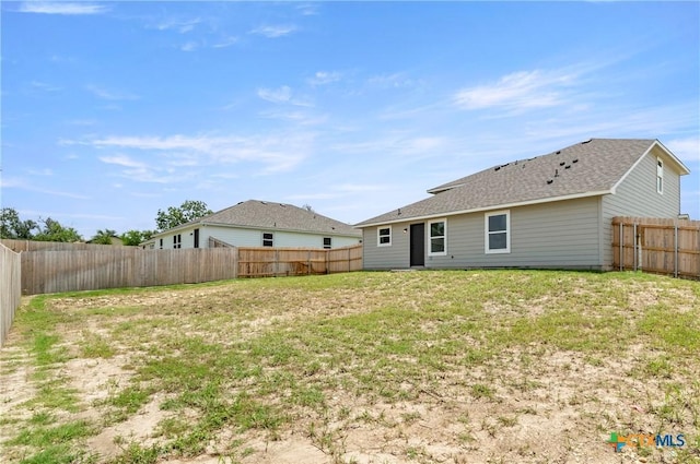 3820 Keller Rd, Temple, TX 76504 - rear view of property with a fenced backyard and roof with shingles