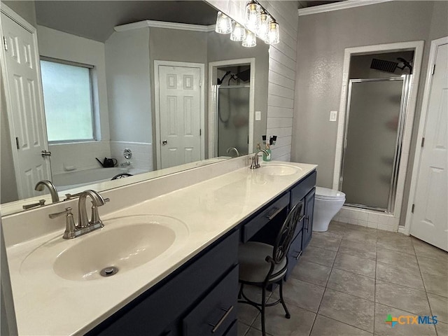 4001 Hopi Trl, Temple, TX 76504 - bathroom with a shower stall, double vanity, tile patterned flooring, crown molding, and toilet