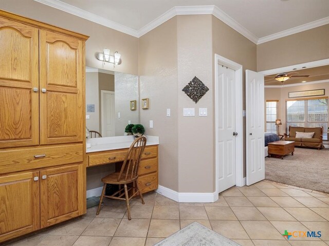 bathroom featuring tile patterned flooring, ceiling fan, and crown molding