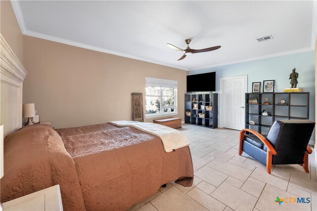 bedroom featuring ceiling fan, crown molding, and light tile patterned flooring