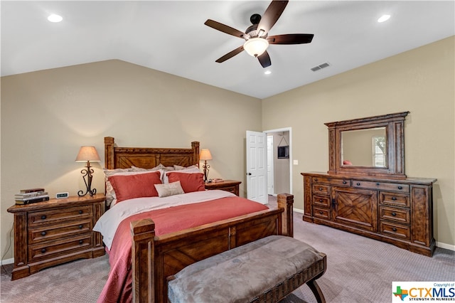 carpeted bedroom featuring ceiling fan and lofted ceiling