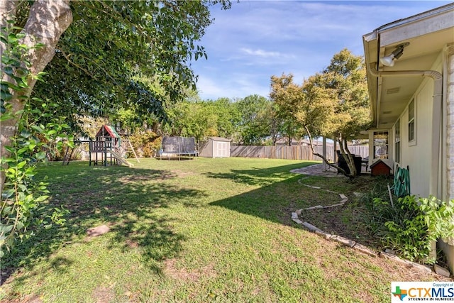 1274 Fox Glen Rd, New Braunfels, TX 78130 - view of yard featuring a shed, a playground, an outbuilding, and a trampoline