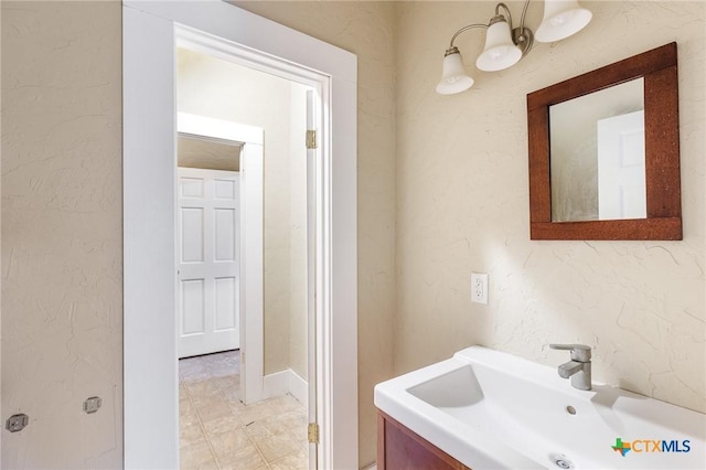 302 Avenue N, Marble Falls, TX 78654 - bathroom featuring vanity and a textured wall