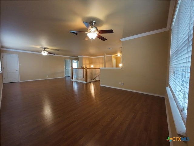 unfurnished living room with dark hardwood / wood-style flooring, ceiling fan, and ornamental molding