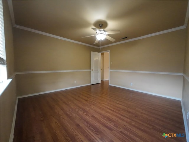 unfurnished room featuring dark hardwood / wood-style floors, ceiling fan, and crown molding