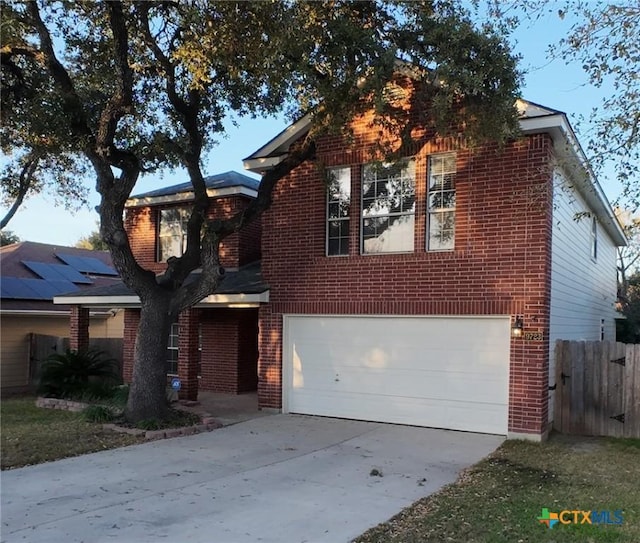 view of property featuring a garage