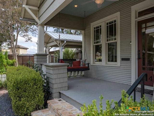 view of patio / terrace featuring ceiling fan and covered porch