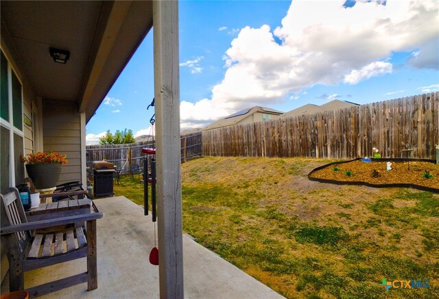 view of yard with a patio area