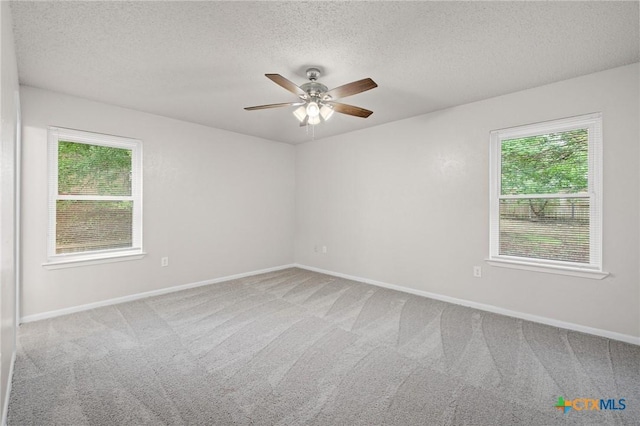 906 Laurie Ln, Copperas Cove, TX 76522 - carpeted spare room featuring plenty of natural light, a textured ceiling, and a ceiling fan