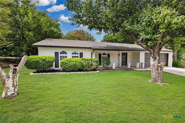 906 Laurie Ln, Copperas Cove, TX 76522 - single story home with an attached garage, concrete driveway, a porch, a front yard, and stucco siding