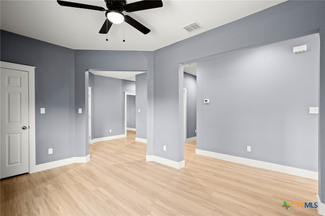 unfurnished room featuring ceiling fan and light hardwood / wood-style floors