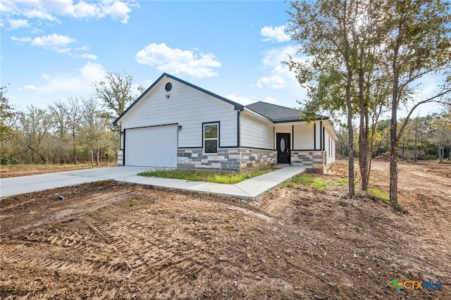 view of front of property featuring a garage