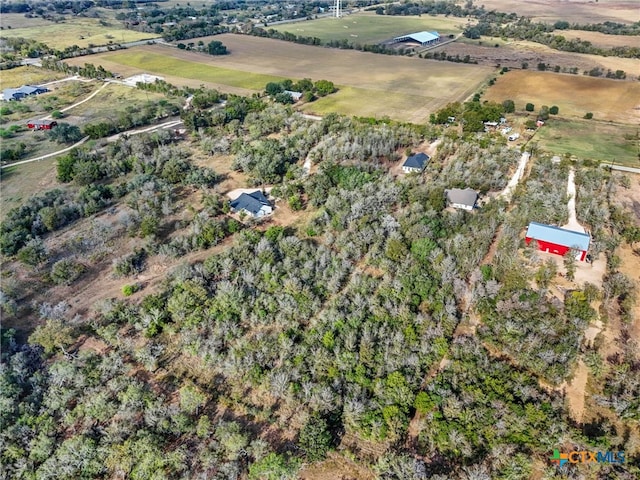 birds eye view of property featuring a rural view