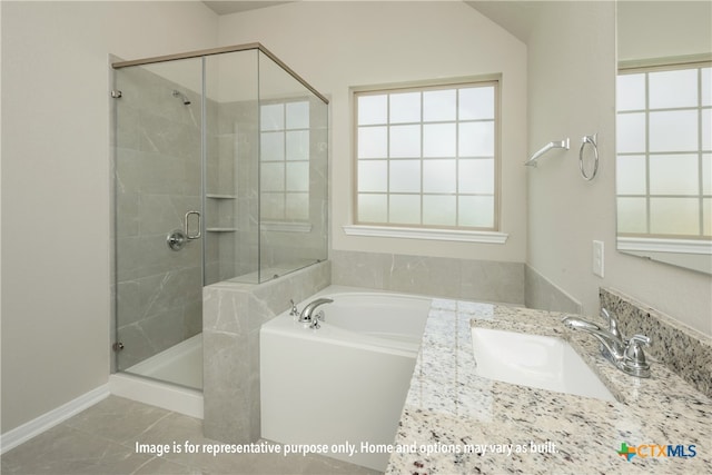 bathroom with vaulted ceiling, sink, tile patterned floors, and plus walk in shower