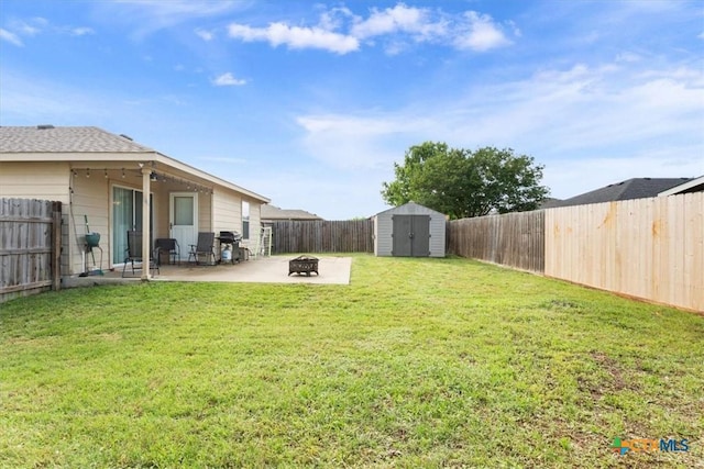 216 Pullman Place Blvd, Temple, TX 76502 - view of yard with a shed, a patio, a fire pit, and an outdoor structure