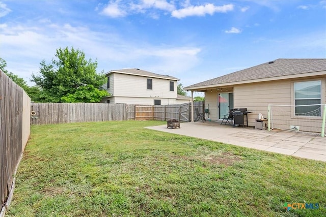 216 Pullman Place Blvd, Temple, TX 76502 - view of yard featuring a patio area and a fire pit